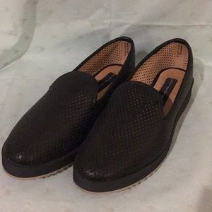 Steven by Steve Madden perforated black flats